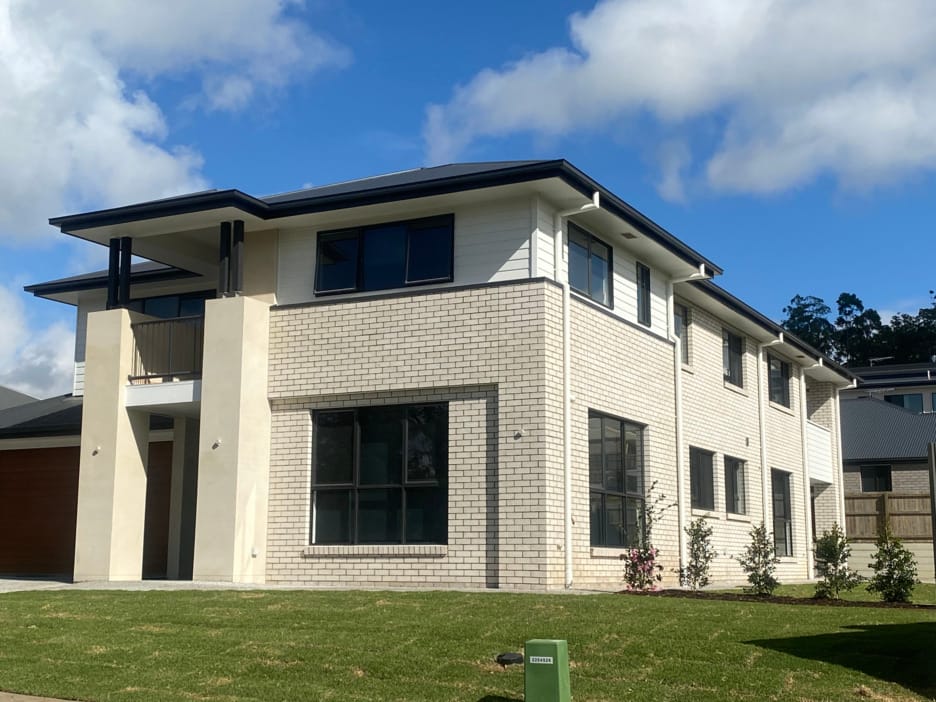 PGH white brick facade used on residential and commercial building projects.