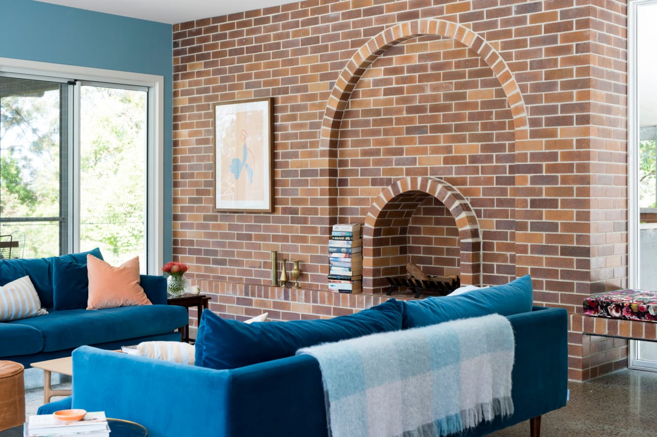 Exterior bricks used in stylish interior designer home.