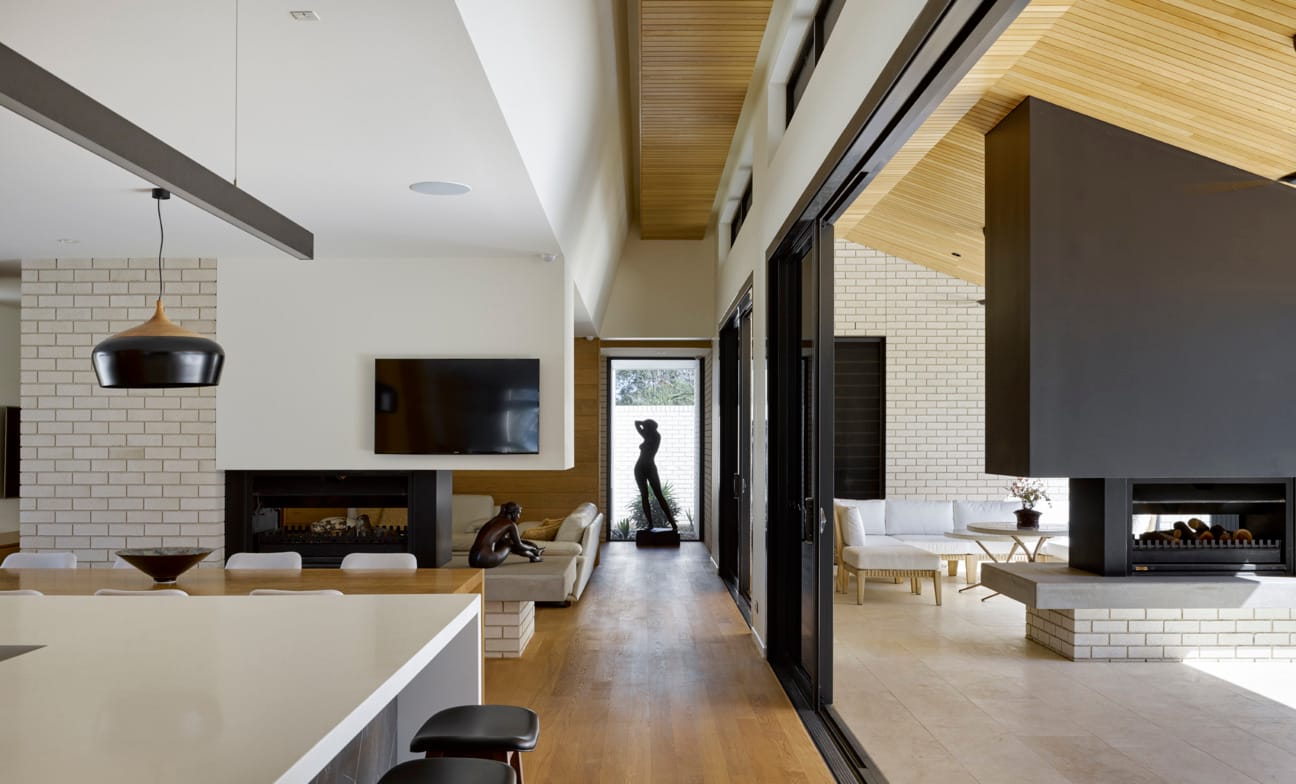 Exterior bricks used in stylish interior designer home.