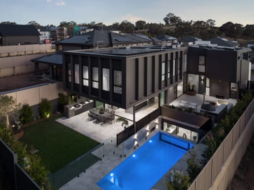 PGH Bricks sleek Morada bricks in Nero Satin connecting the inside with the out in a Sydney home.