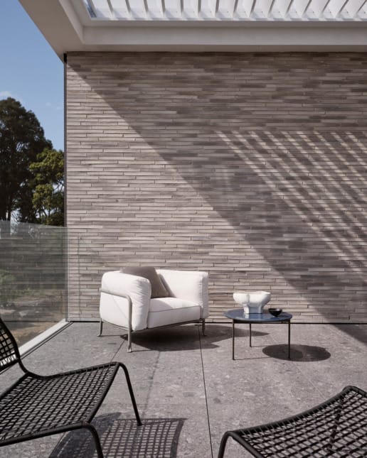 Double Halo House using Lang Mursten Larsen as a feature wall in the Alfresco area between the two buildings.