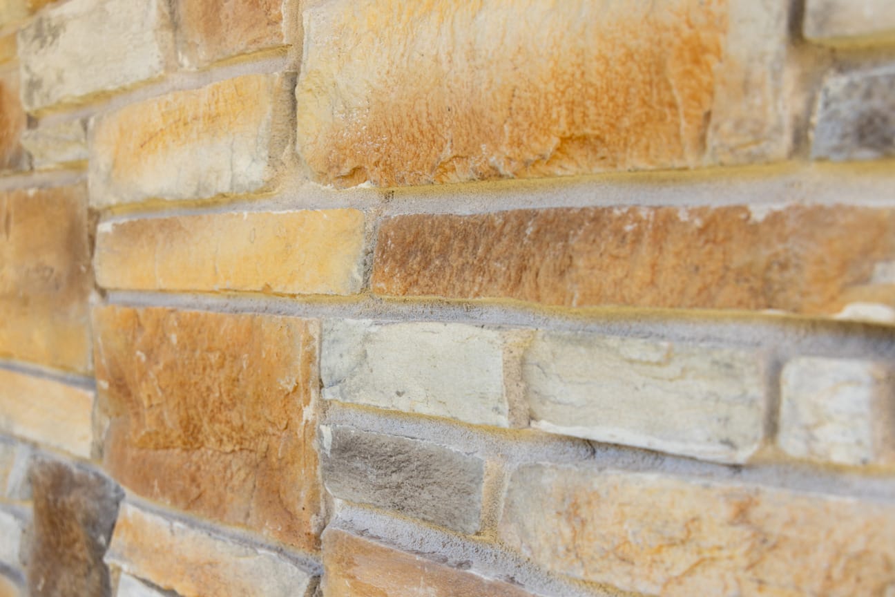 PGH Stone Classic Ledgestone Range in Gilded Sand installed on a wall