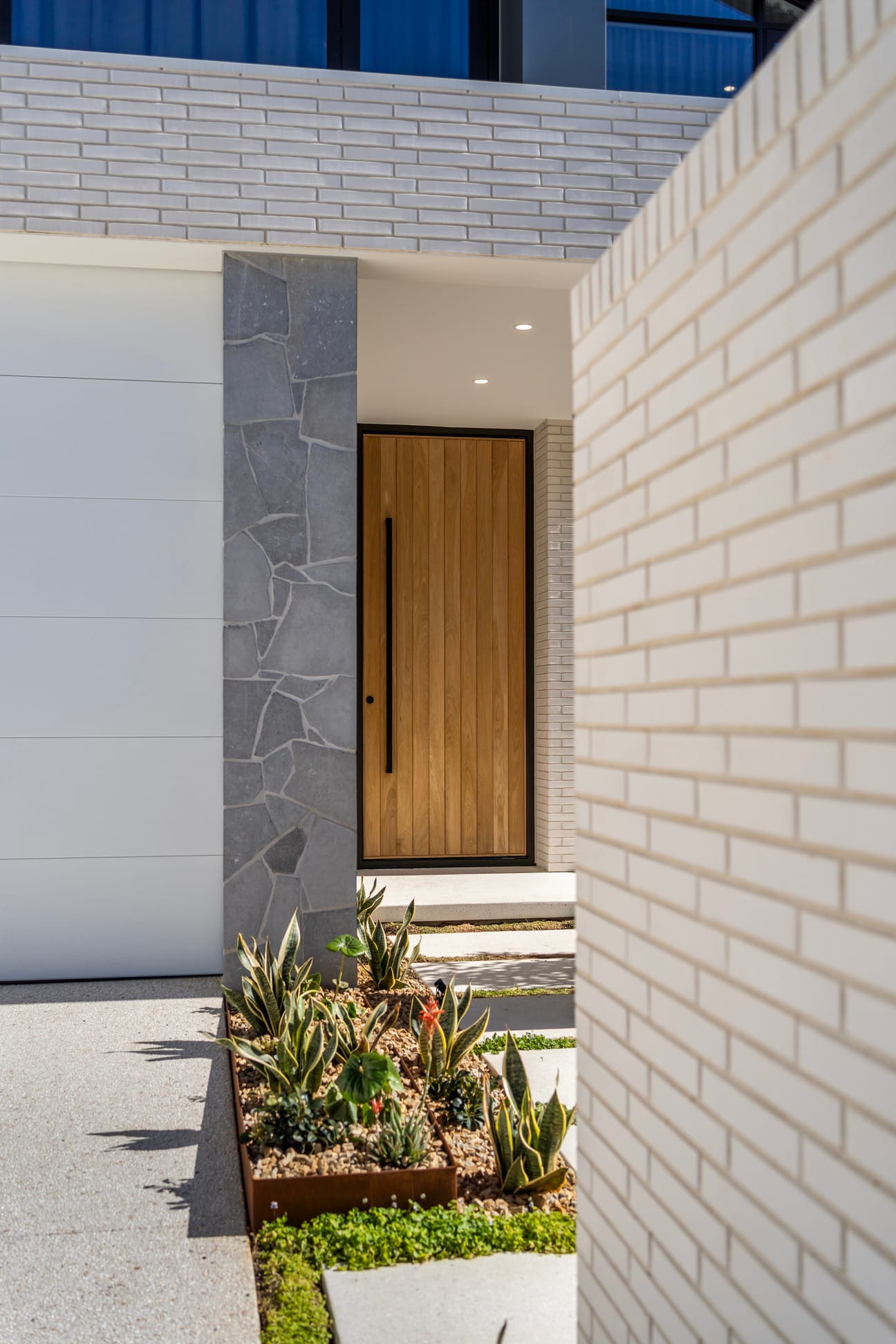 Walkerville project by Diaz Homes, featuring PGH Morada Blanco Linear bricks