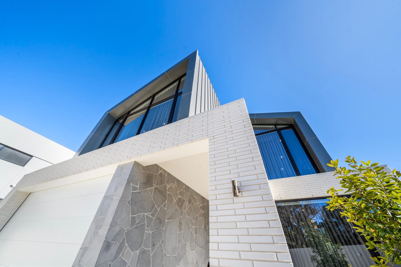 Walkerville project by Diaz Homes, featuring PGH Morada Blanco Linear bricks