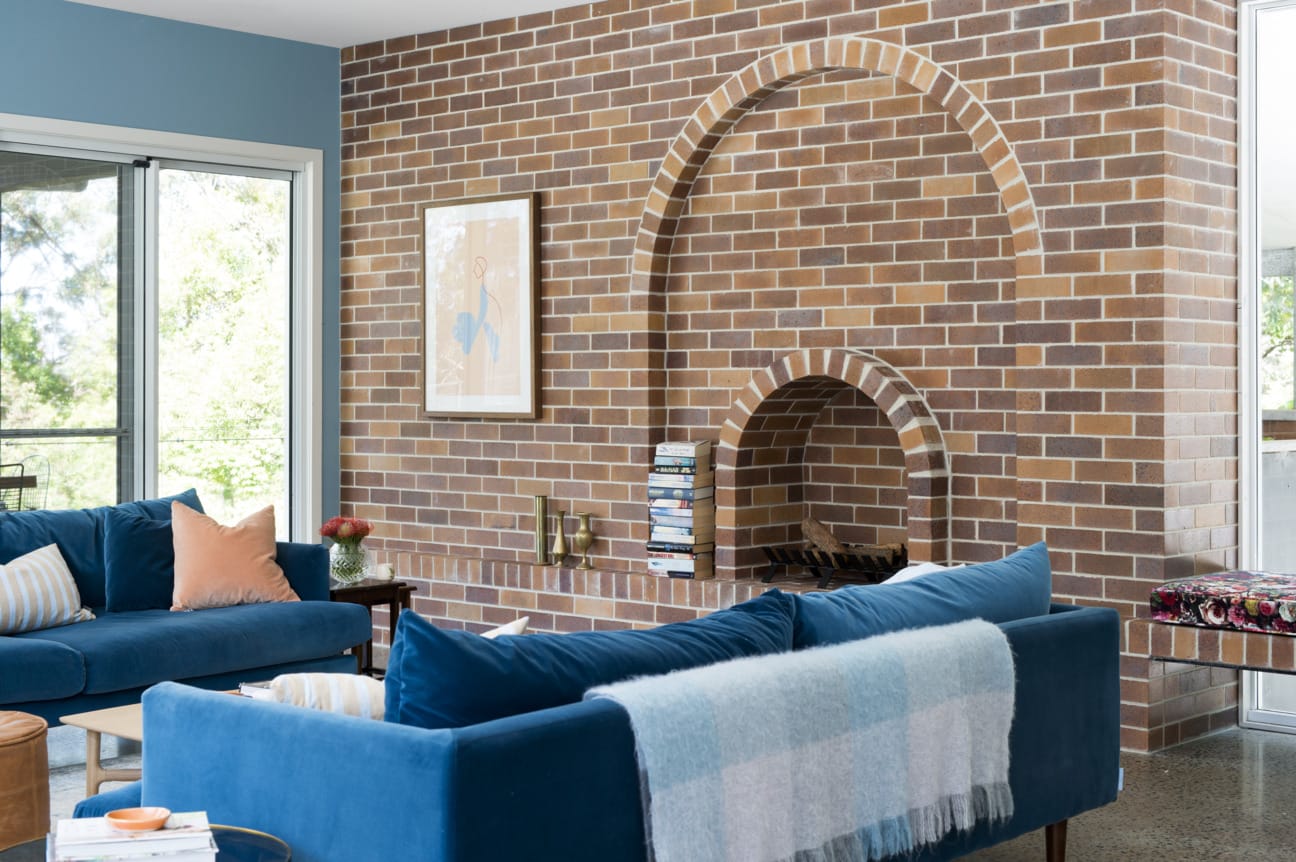 Exterior bricks used in stylish interior designer home.