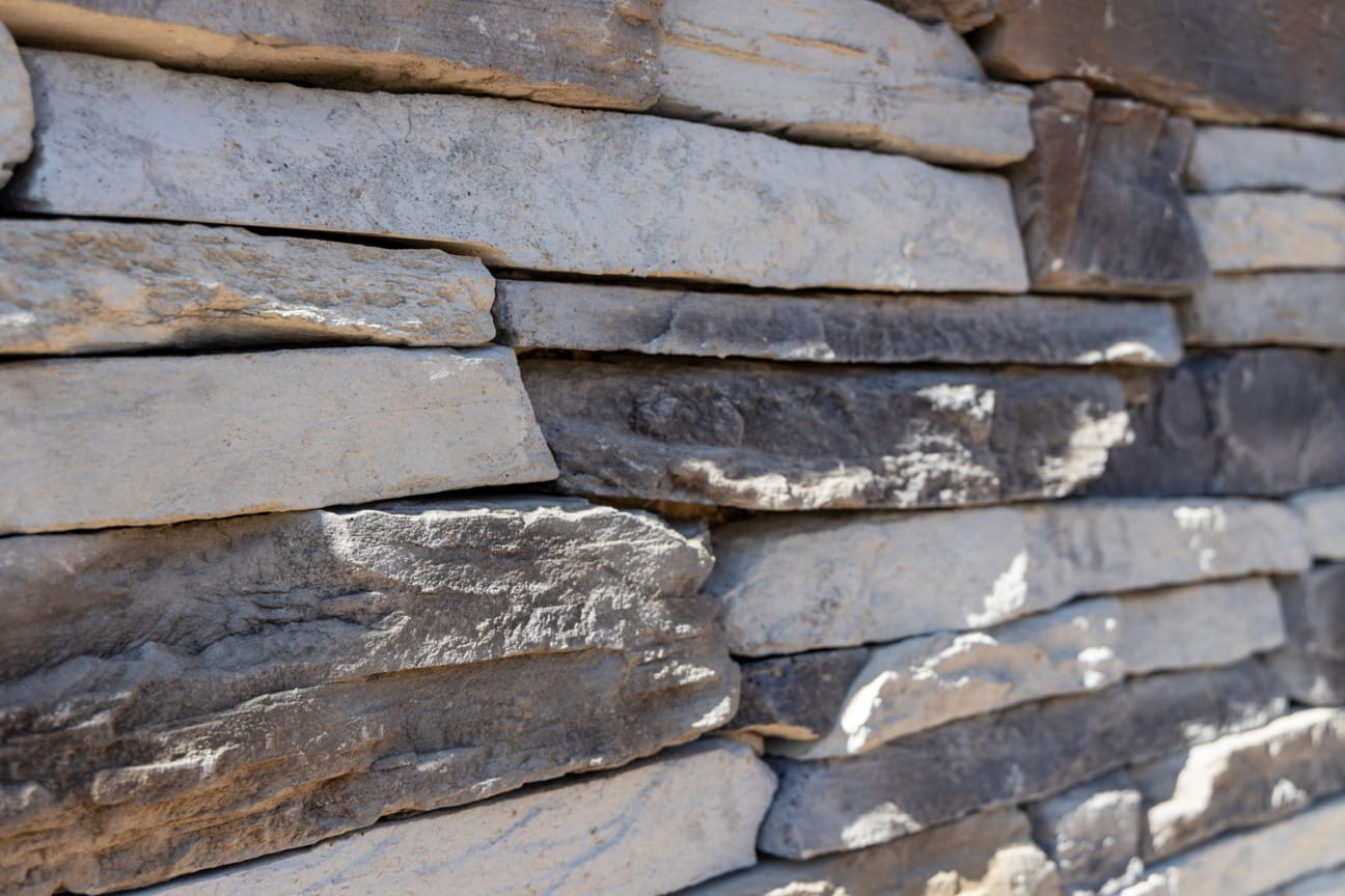 PGH Stone Rugged Ledgestone Range in Alpine Grey installed on a wall 