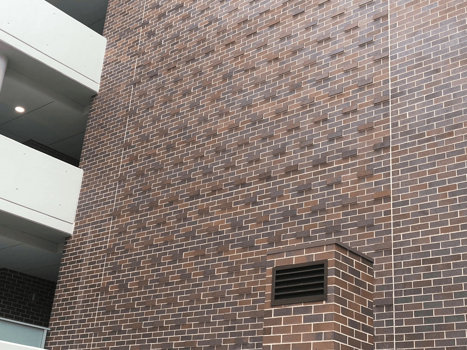 Nickel Flash brick from PGH in Metallic range apartments block