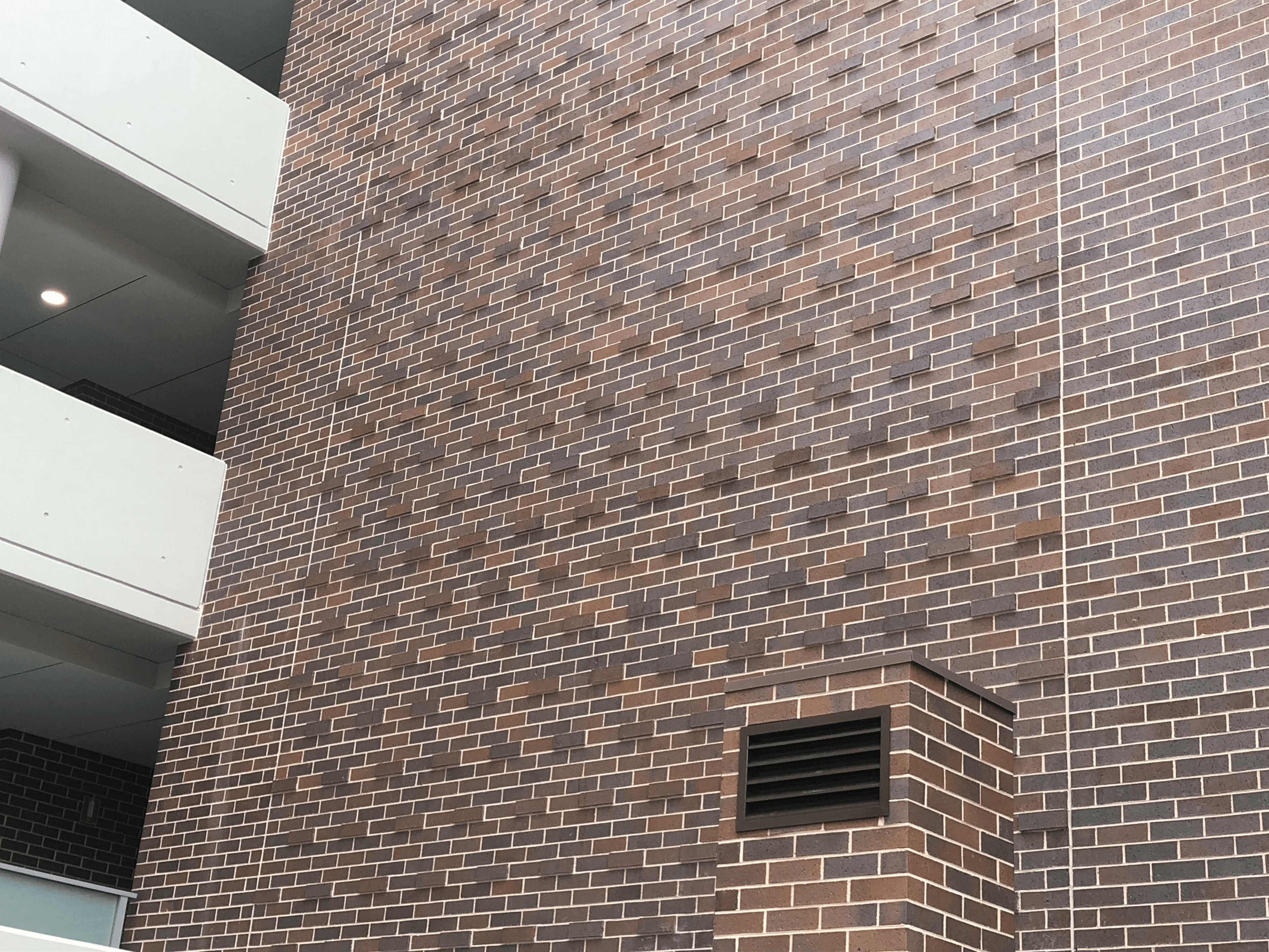 Nickel Flash brick from PGH in Metallic range apartments block