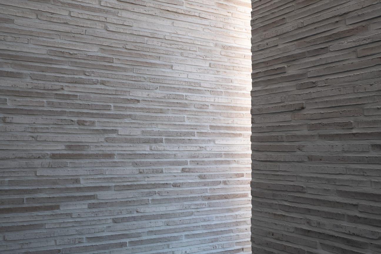 Exterior bricks used in stylish interior designer home.