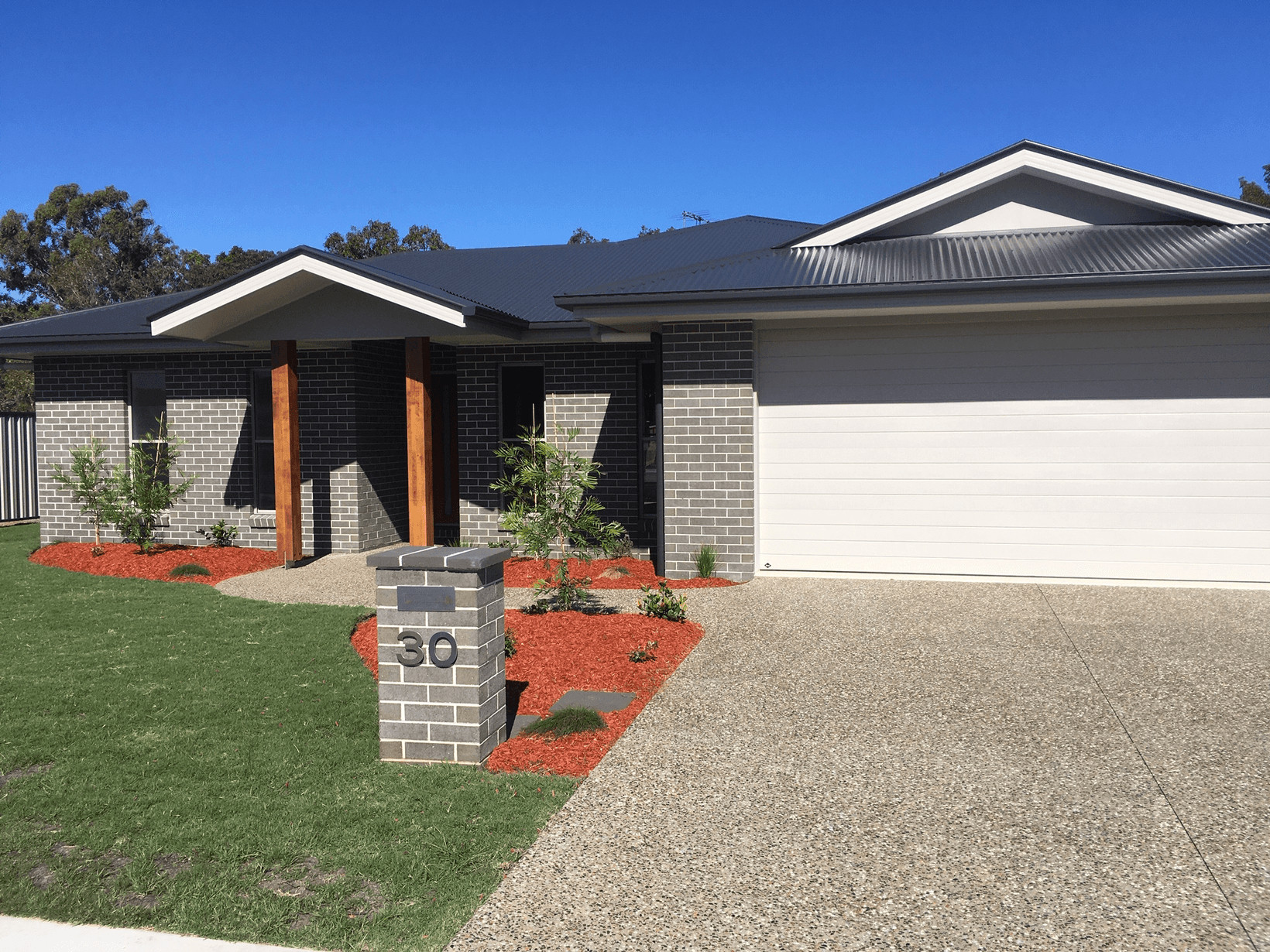 Agave brick from PGH in Zen by Nature range, single storey house front