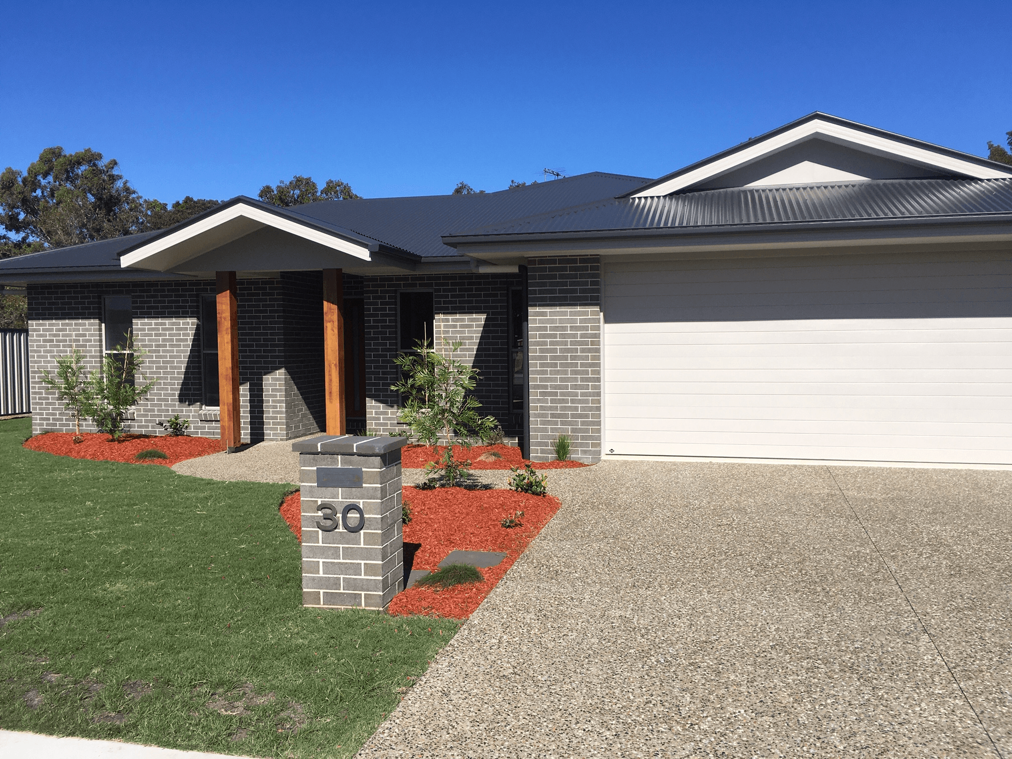 Agave brick from PGH in Zen by Nature range, single storey house front