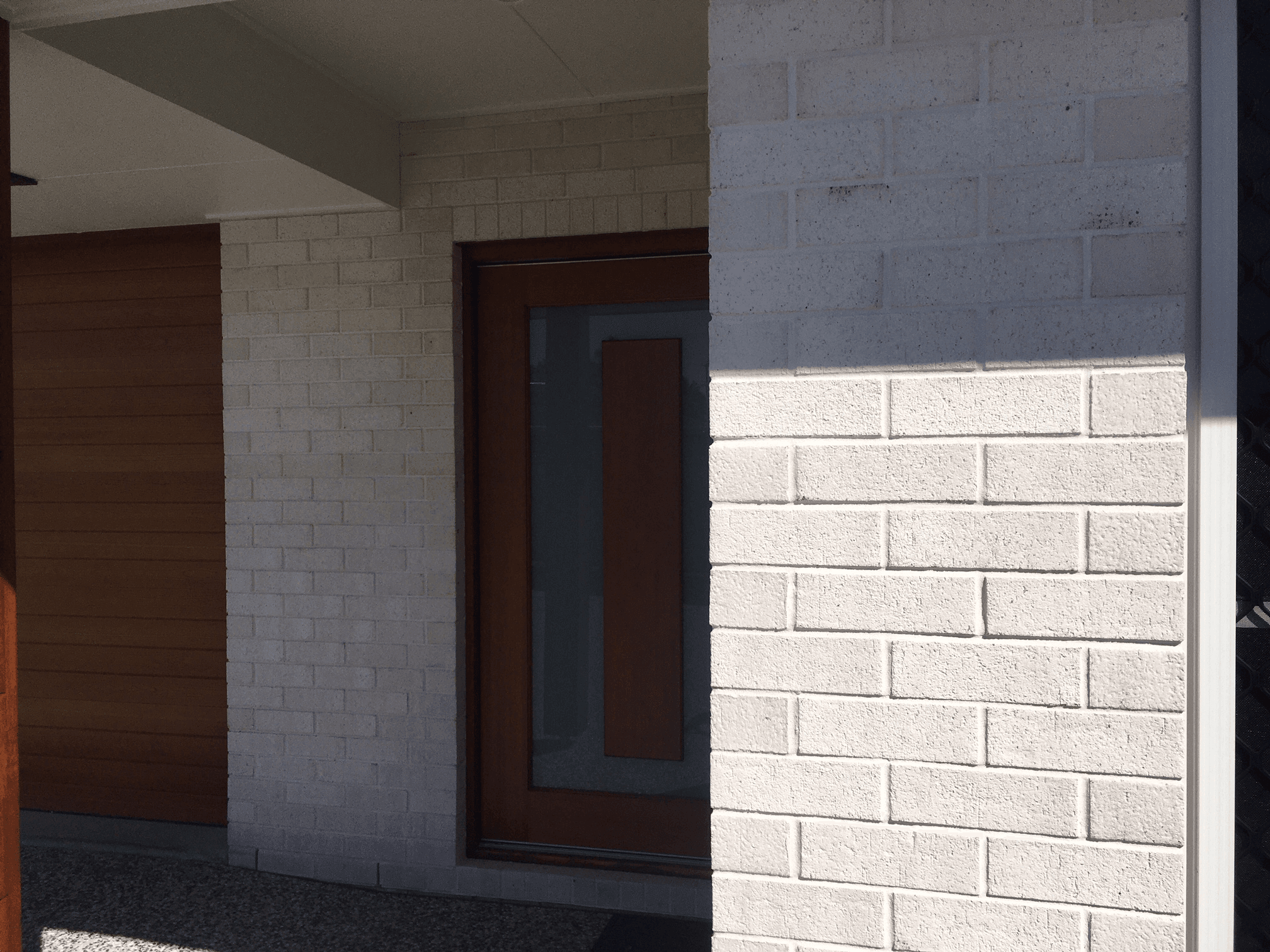 Salt brick from PGH in Zen by Nature range up close to timber feature front door