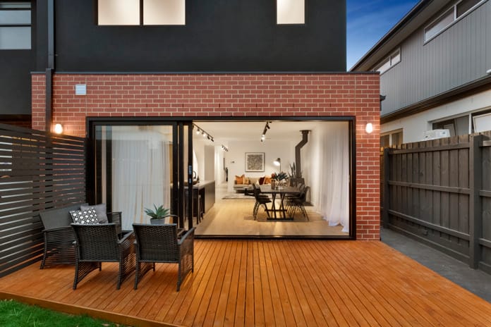 Red bricks used to create a contemporary townhouse interpretation of a family home in Altona Victoria