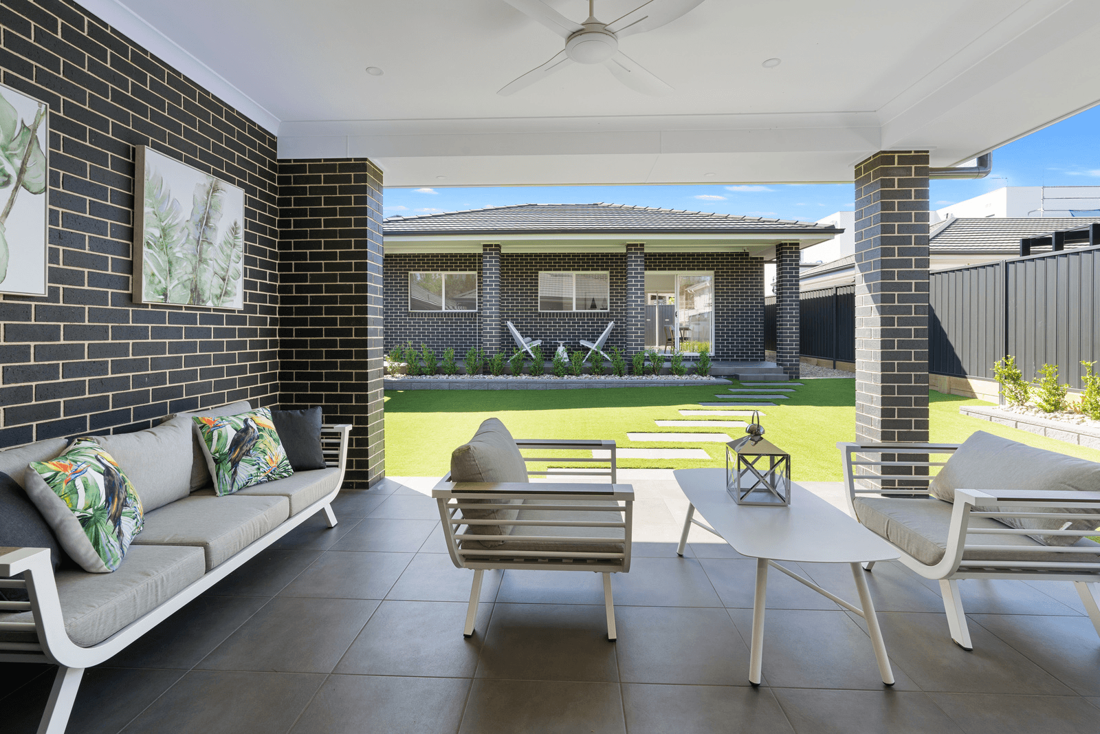 Espresso brick exterior house outdoor entertaining