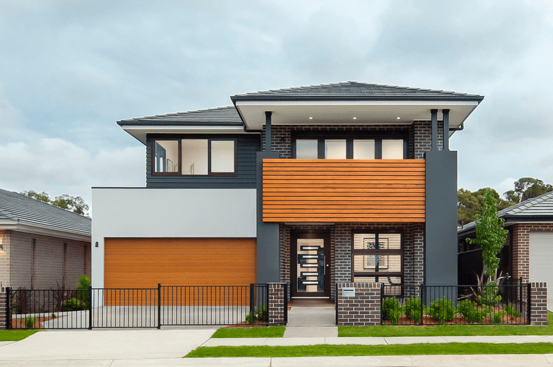 Pewter brick from PGH in Metallic range with timber garage and facade, Champion Homes