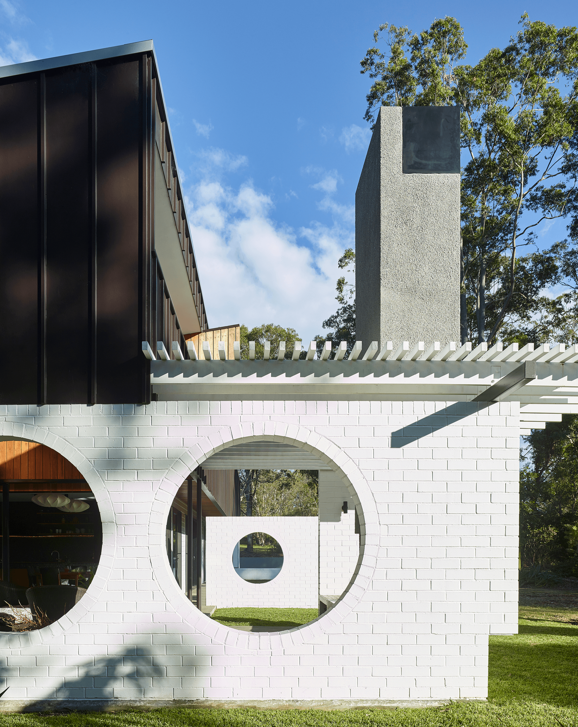 The Long House using Commons bricks painted white.