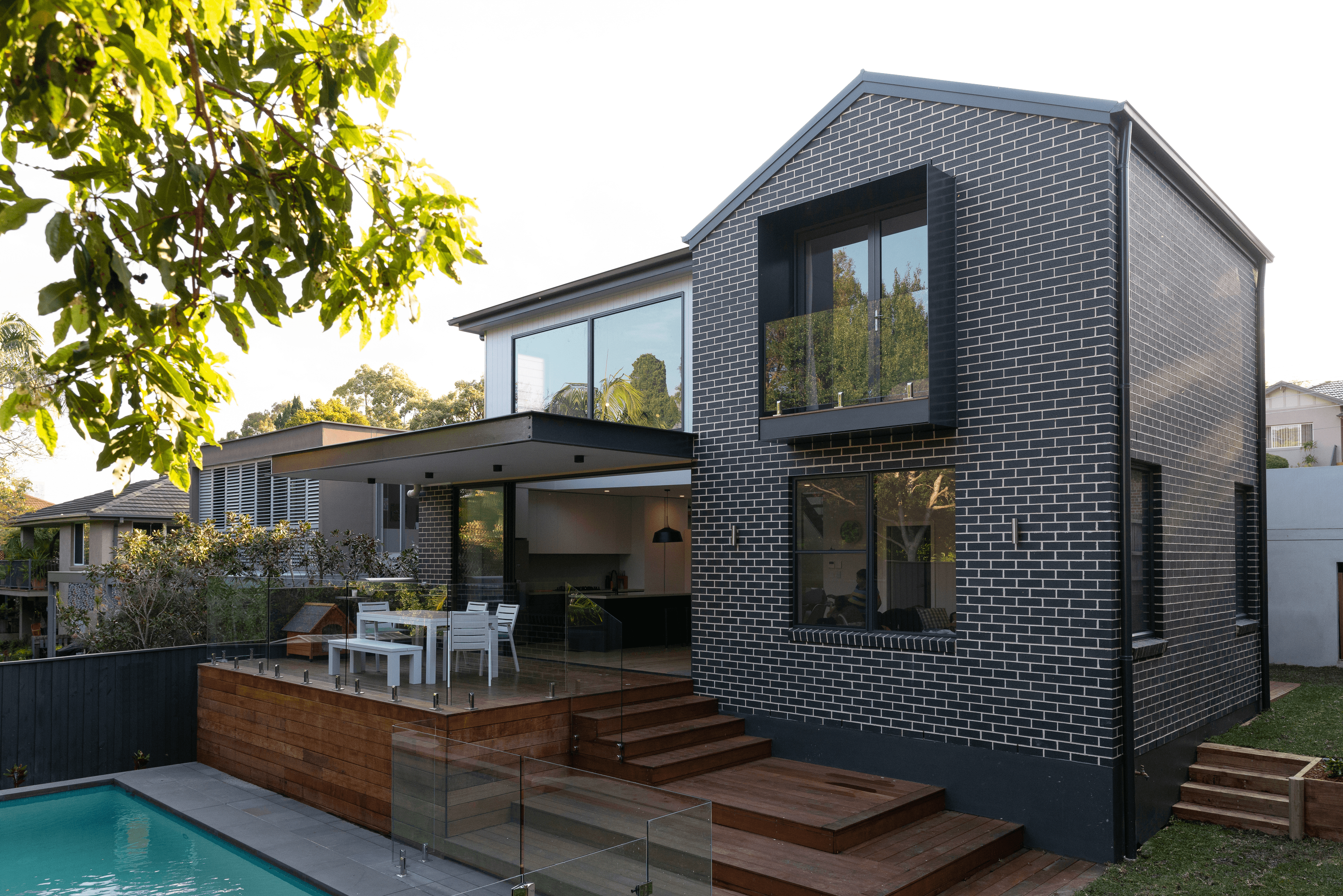 Espresso brick exterior house outdoor entertaining