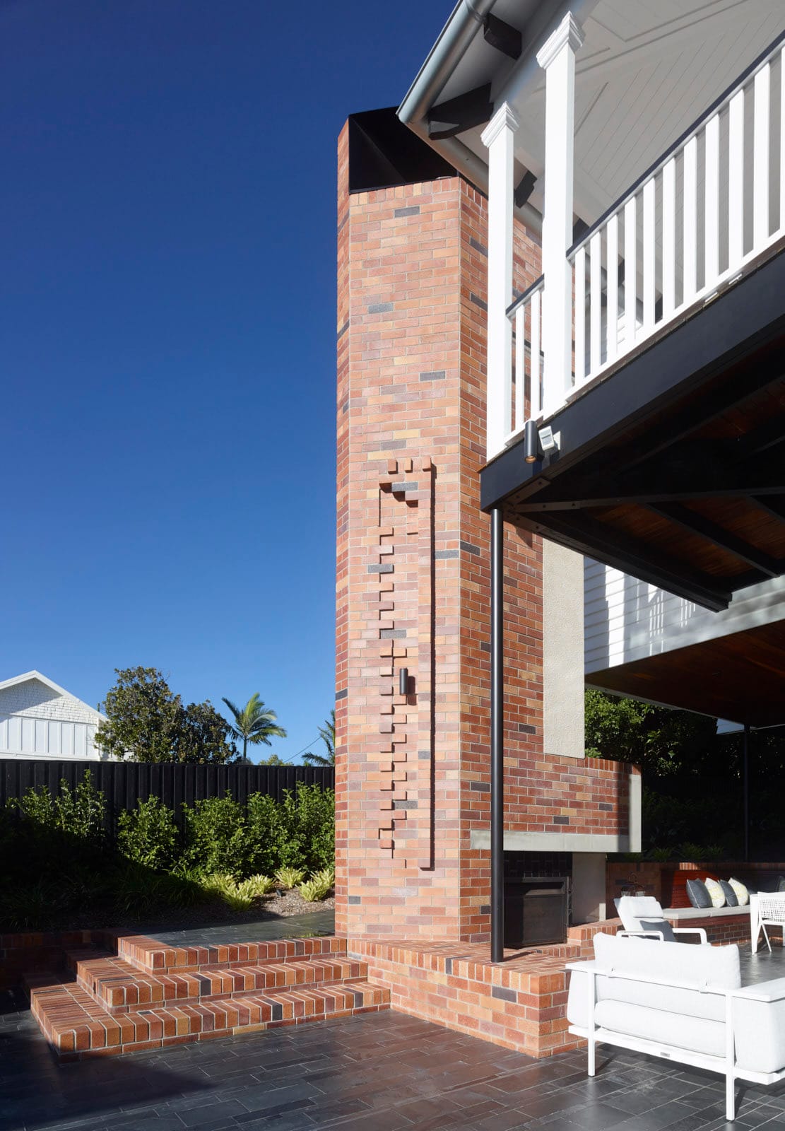 Monaise Residence in the Brisbane suburb of Ascot showcasing a blend of traditional Queenslander, Colonial, and Tudor architectural styles.