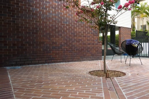 Camp Hill Terrace using PGH Bricks Black & Tan as a solution to a waterlogged yard.