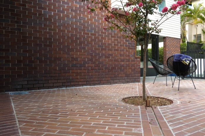 Camp Hill Terrace using PGH Bricks Black & Tan as a solution to a waterlogged yard.