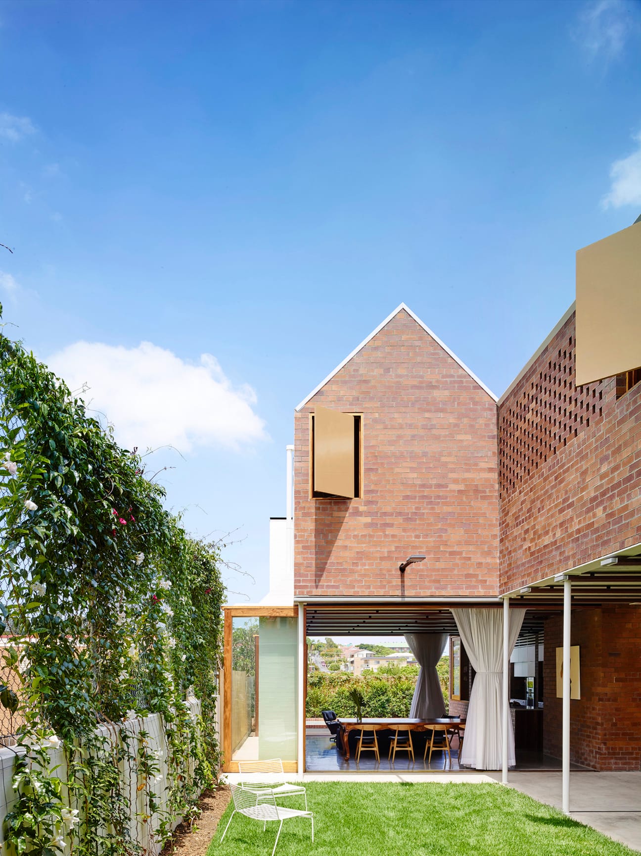 Black and Tan brick, Smooth range. Christian Street House, James Russsell Architects, Toby Scott