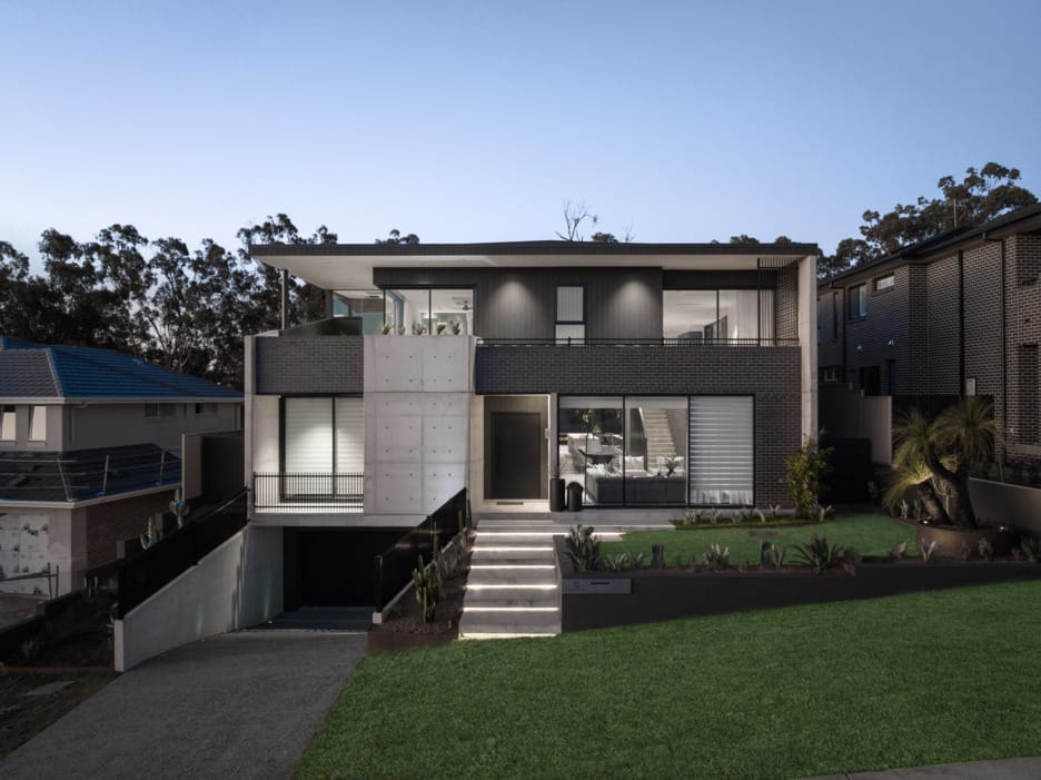 PGH Bricks sleek Morada bricks in Nero Satin connecting the inside with the out in a Sydney home.