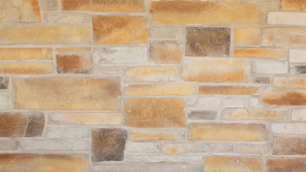 PGH Stone Classic Ledgestone Range in Gilded Sand installed on a wall