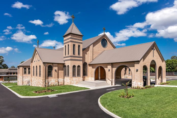 Holy Family Church using PGH Bricks with a modern twist on Romanesque style architecture.