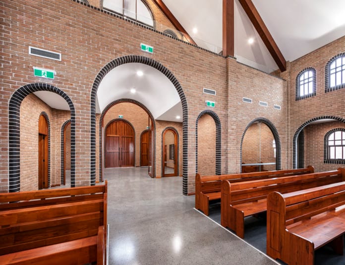 Holy Family Church using PGH Bricks with a modern twist on Romanesque style architecture.