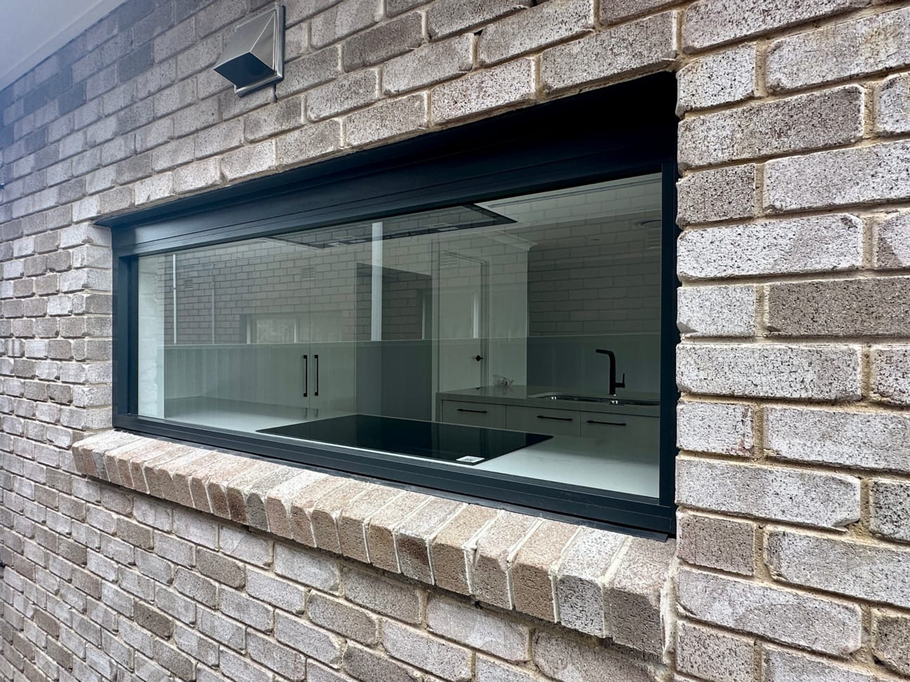 Sea Fossil brick from PGH in shoreline | Marksman Homes