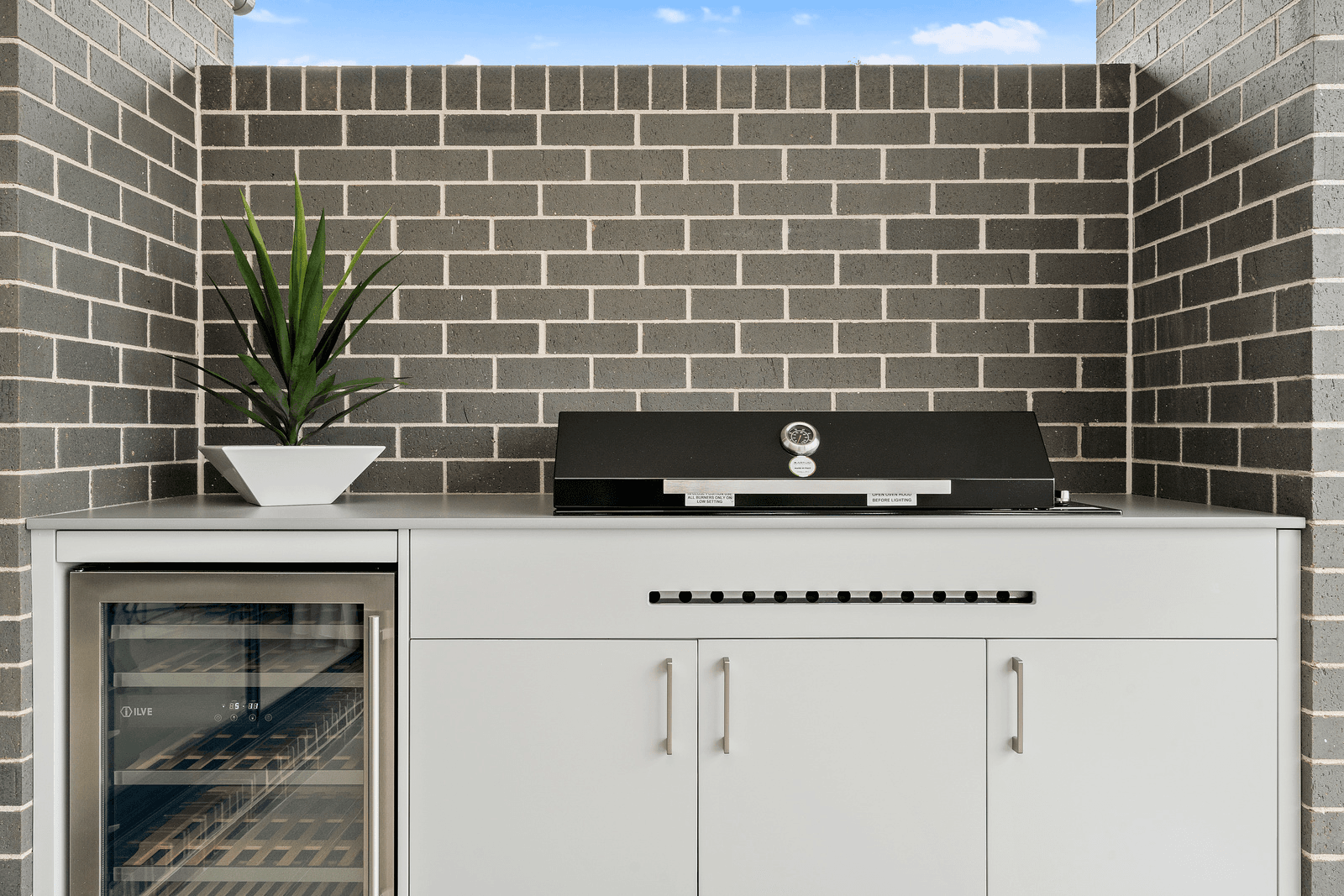 Truffle brick with outdoor barbeque in alfresco area