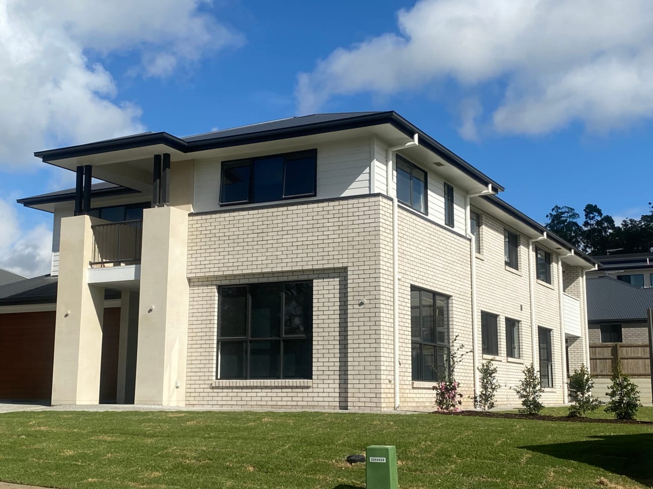 PGH white brick facade used on residential and commercial building projects.