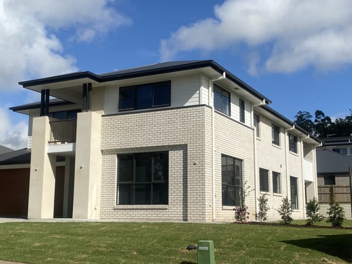 PGH white brick facade used on residential and commercial building projects.