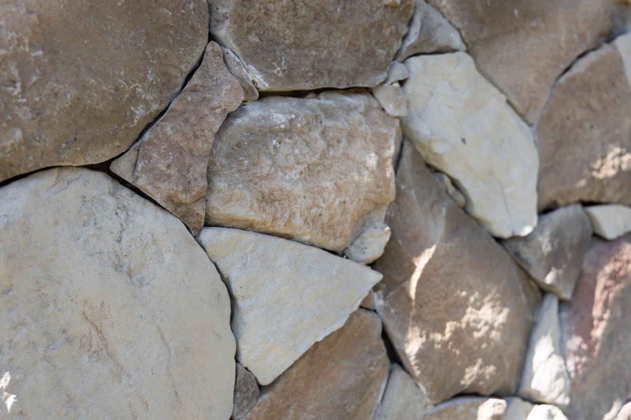 PGH Stone Natural Fieldstone Range in Russet installed on a wall