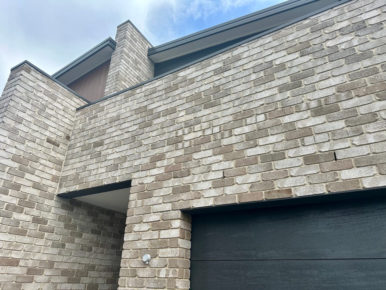 Sea Fossil brick from PGH in shoreline | Marksman Homes