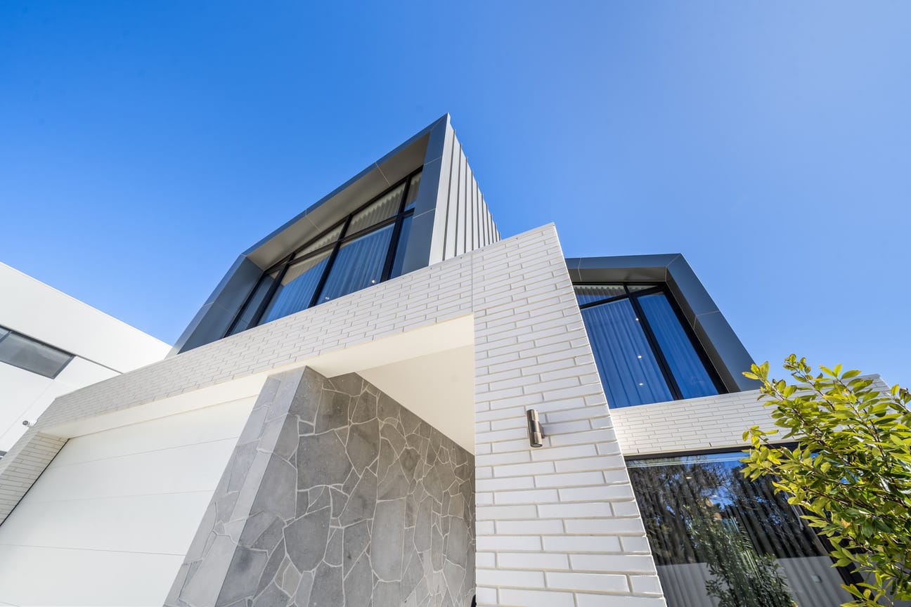 Walkerville project by Diaz Homes, featuring PGH Morada Blanco Linear bricks